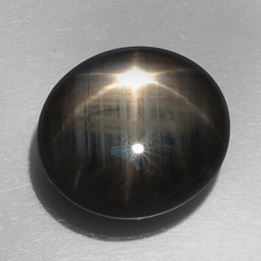Safira estrela preto natural 32,76ct, corte oval, opaco