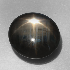 Safira estrela preto natural 32,76ct, corte oval, opaco