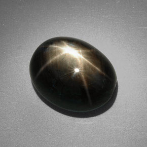 Safira estrela preto natural 9,85ct, corte oval, opaco