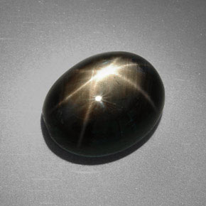 Safira estrela preto natural 9,85ct, corte oval, opaco