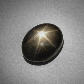 Safira estrela preto natural 5,63ct, corte oval, opaco