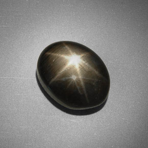 Safira estrela preto natural 5,63ct, corte oval, opaco