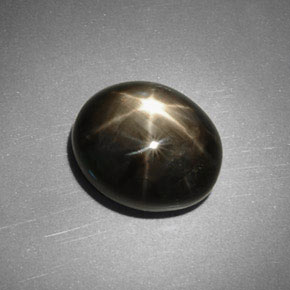 Safira estrela preto natural 5,75ct, corte oval, opaco