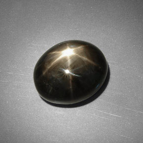 Safira estrela preto natural 5,75ct, corte oval, opaco