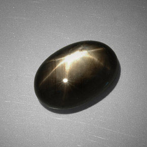 Safira estrela preto natural 7,83ct, corte oval, opaco