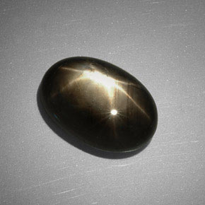 Safira estrela preto natural 7,83ct, corte oval, opaco