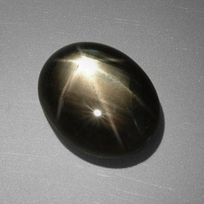 Safira estrela preto natural 11,40ct, corte oval, opaco