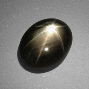 Safira estrela preto natural 11,40ct, corte oval, opaco