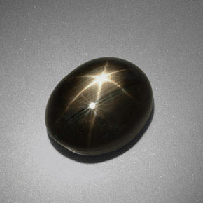 Safira estrela preto natural 9,92ct, corte oval, opaco