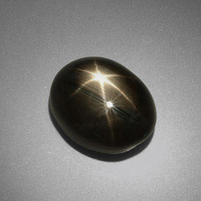 Safira estrela preto natural 9,92ct, corte oval, opaco