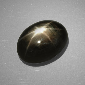 Safira estrela preto natural 9,24ct, corte oval, opaco