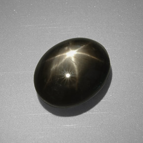 Safira estrela preto natural 5,63ct, corte oval, opaco