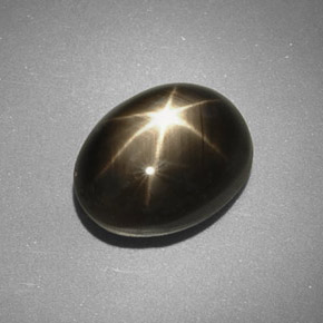 Safira estrela preto natural 5,66ct, corte oval, opaco