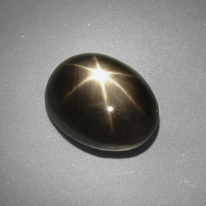 Safira estrela preto natural 5,66ct, corte oval, opaco