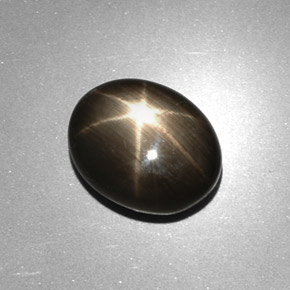 Safira estrela preto natural 6,17ct, corte oval, opaco