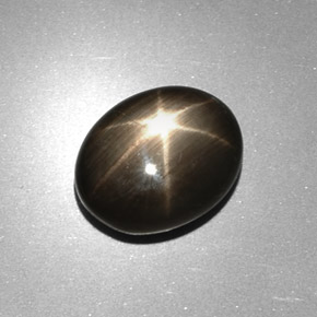 Safira estrela preto natural 6,17ct, corte oval, opaco