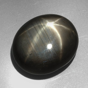 Safira estrela preto natural 27,29ct, corte oval, opaco