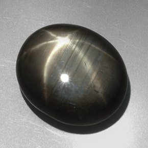 Safira estrela preto natural 27,29ct, corte oval, opaco