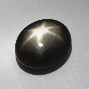 Safira estrela preto natural 27,17ct, corte oval, opaco