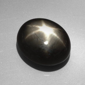 Safira estrela preto natural 27,17ct, corte oval, opaco