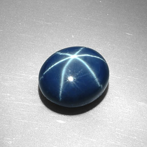 Safira estrela azul natural 6,78ct, corte oval, opaco