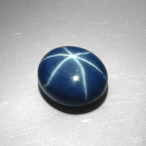 Safira estrela azul natural 6,78ct, corte oval, opaco