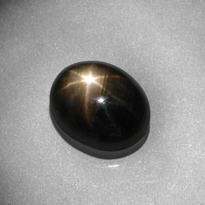 Safira estrela preto natural 8,13ct, corte oval, opaco