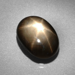Safira estrela preto natural 6,62ct, corte oval, opaco