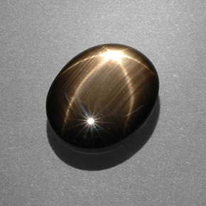 Safira estrela preto natural 7,53ct, corte oval, opaco