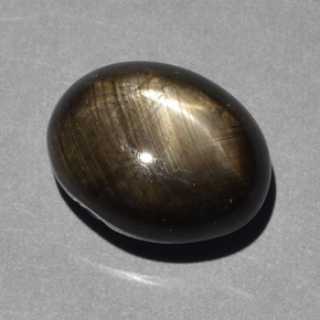Safira estrela preto natural 10,43ct, corte oval, opaco
