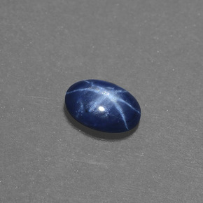Safira estrela azul natural 0,50ct, corte oval, opaco