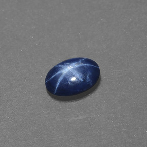 Safira estrela azul natural 0,50ct, corte oval, opaco