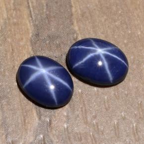 Pedras preciosas de safira estrela azul natural de 1,97 ct, corte oval, opaco