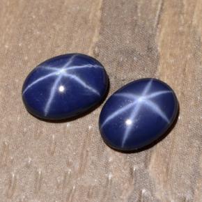 Pedras preciosas de safira estrela azul natural de 1,97 ct, corte oval, opaco
