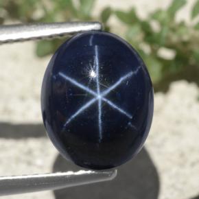 Safira estrela azul natural 6,88ct, corte oval, opaco