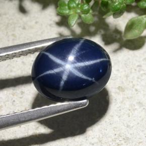 Safira estrela azul natural 3,84ct, corte oval, opaco