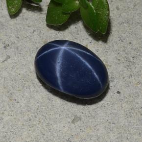 Safira estrela azul natural 1,07ct, corte oval, opaco