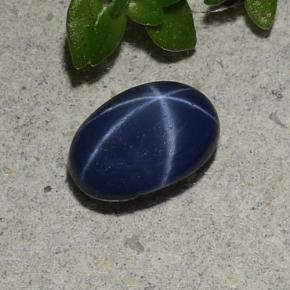 Safira estrela azul natural 1,07ct, corte oval, opaco