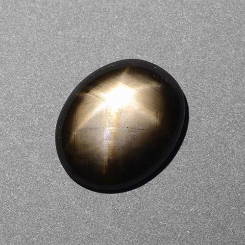 Safira estrela preto natural 2,39ct, corte oval, opaco