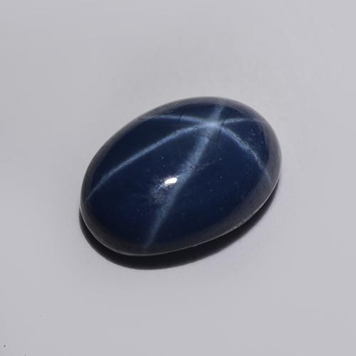 Safira estrela azul natural 1,30ct, corte oval, translúcido