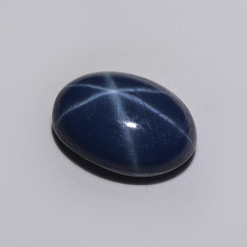 Safira estrela azul natural 1,30ct, corte oval, translúcido