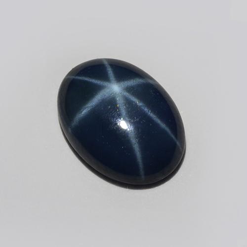 Safira estrela azul natural 0,85ct, corte oval, translúcido