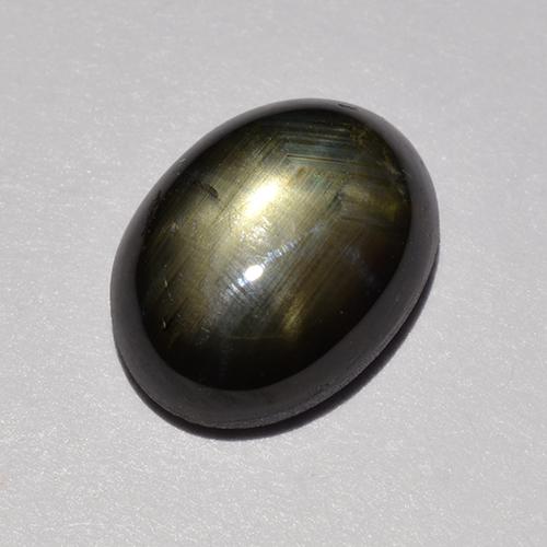 Safira estrela preto natural 1,47ct, corte oval, opaco