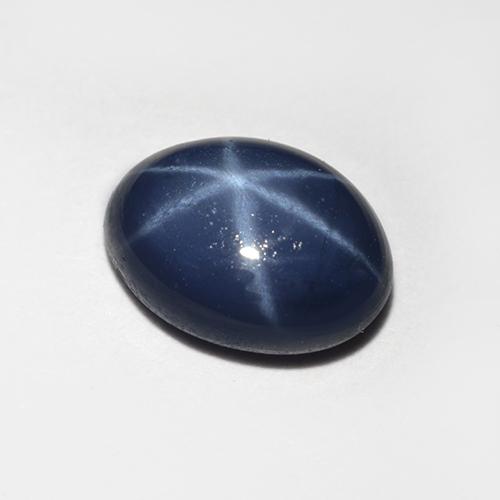 Safira estrela azul natural 1,28ct, corte oval, opaco