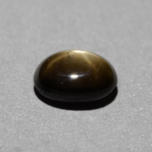 Safira estrela preto natural 0,95ct, corte oval, opaco
