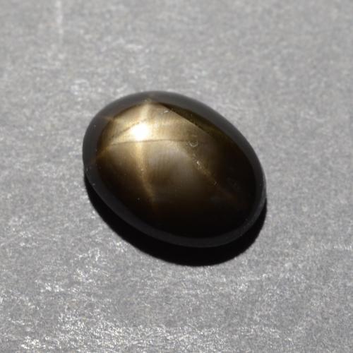 Safira estrela preto natural 1,12ct, corte oval, opaco