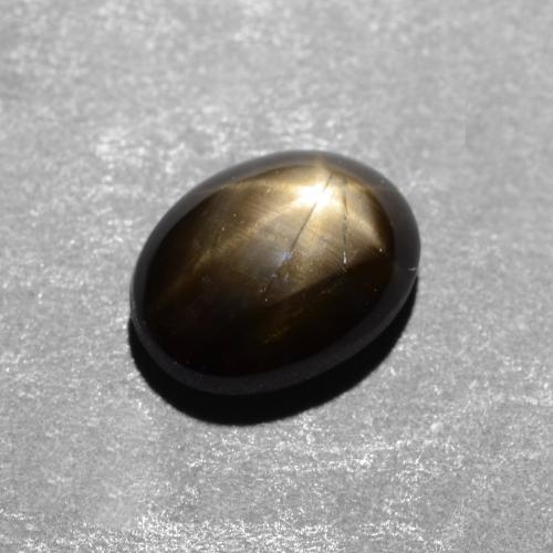 Safira estrela preto natural 1,12ct, corte oval, opaco