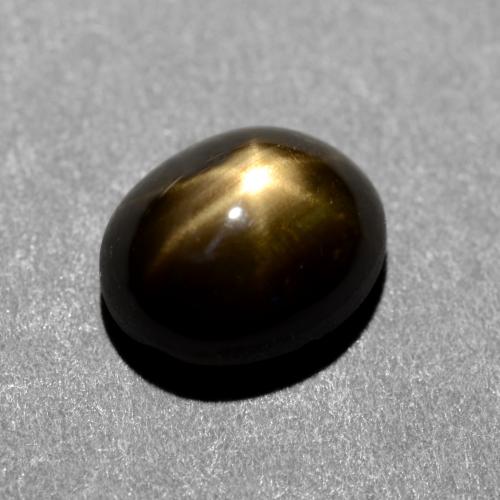 Safira estrela preto natural 1,31ct, corte oval, opaco