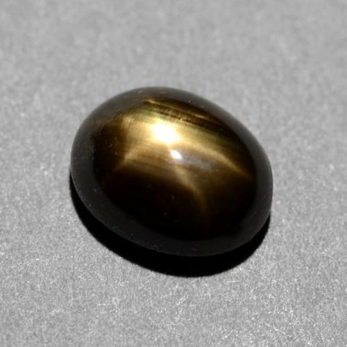 Safira estrela preto natural 1,31ct, corte oval, opaco