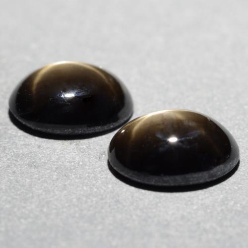Pedras preciosas de safira estrela preto natural de 1,81 ct, corte oval, opaco